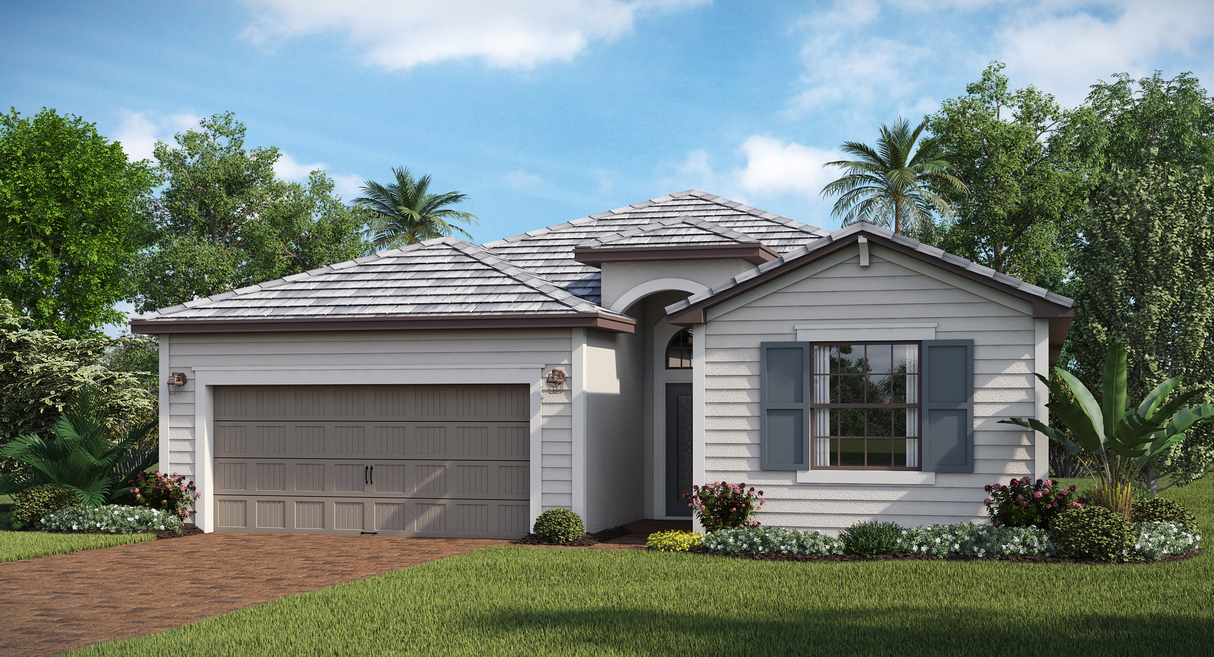 Single-story modern house with a two-car garage and neatly landscaped front yard under a blue sky.