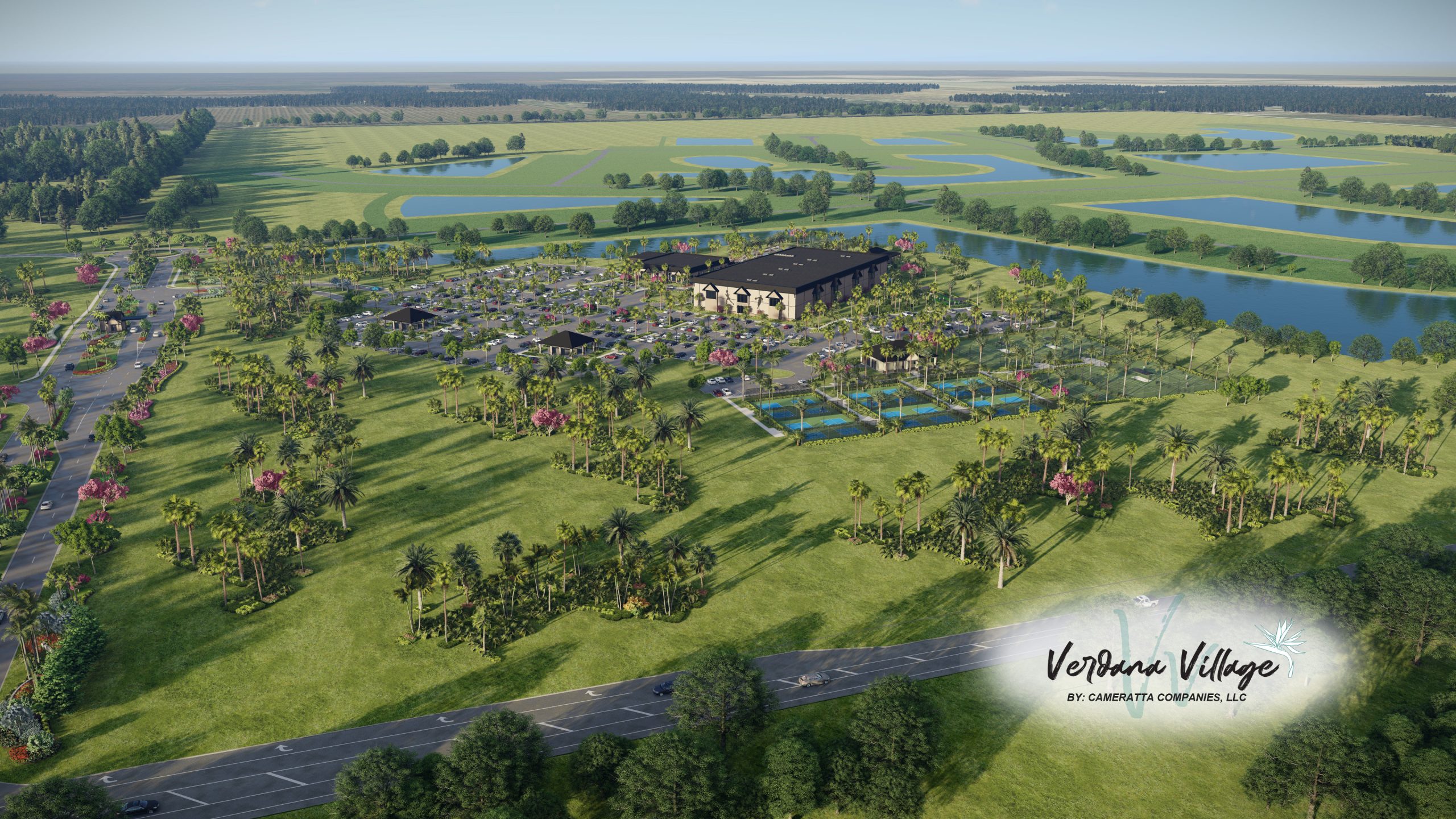 Aerial view of a countryside neighborhood with fields and a river, featuring the cursive text “Virginia Village” in the foreground.
